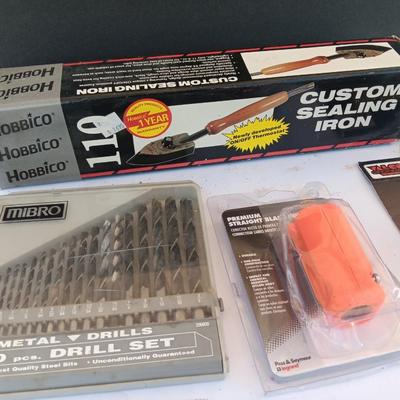 Variety of new in the package tools and accessories