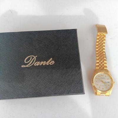 Brand new Dante wallet and a nice Prestige By Waltham Quartz watch