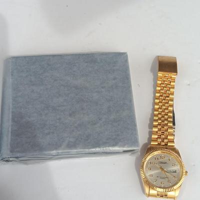 Brand new Dante wallet and a nice Prestige By Waltham Quartz watch