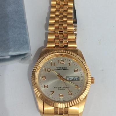 Brand new Dante wallet and a nice Prestige By Waltham Quartz watch