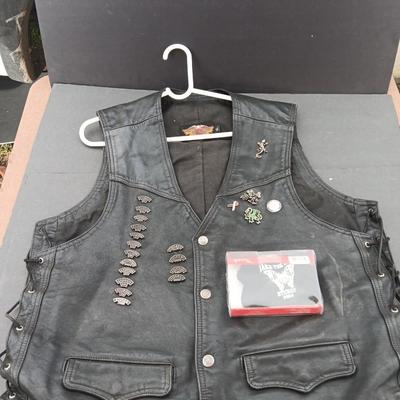 Harley Davidson Size XL Black leather biker vest with a nice collection of Sturgis pins