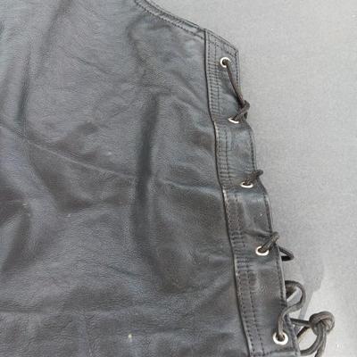 Harley Davidson Size XL Black leather biker vest with a nice collection of Sturgis pins