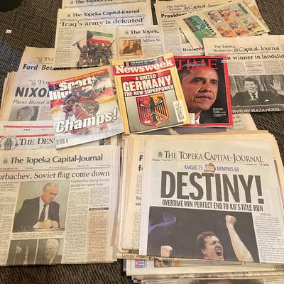 Big stack of vintage news papers