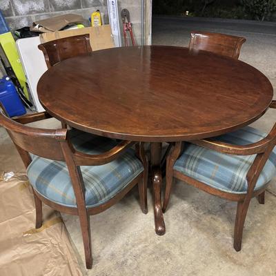 Hancock and Moore Round Table and Four Chairs