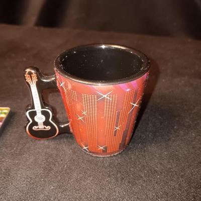 ELVIS PRESLEY SHOT GLASS AND A BUTANE LIGHTER THAT WORKS!
