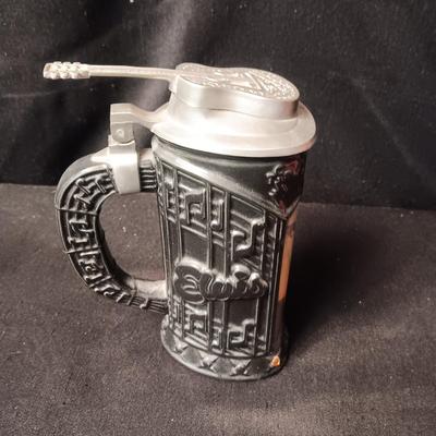 STONEWARE AND PEWTER "HEARTBREAK HOTEL" STEIN