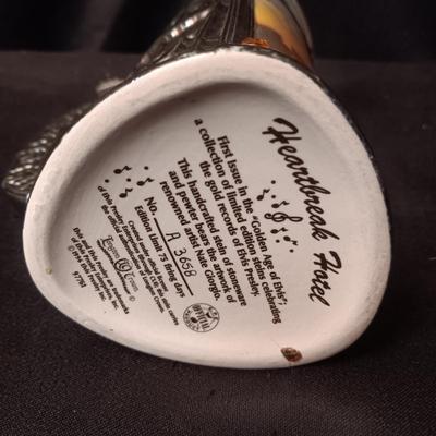 STONEWARE AND PEWTER "HEARTBREAK HOTEL" STEIN
