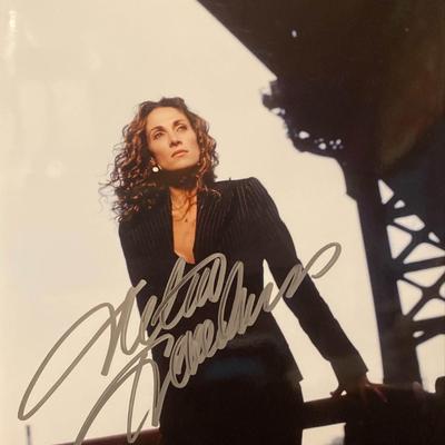 Melina Kanakaredes signed "CSI NY" photo
