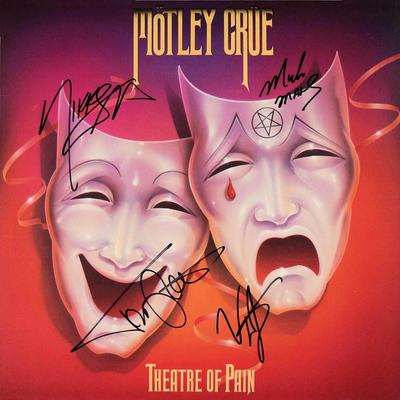 Motley Crue signed Theatre Of Pain album