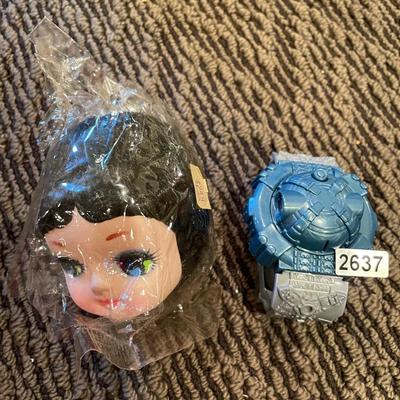 Ninja watch and doll head
