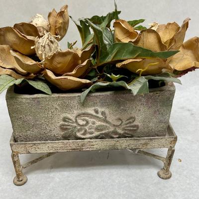 Rustic Faux Flower arrangement in Plaster planter box sitting atop rusty metal platform