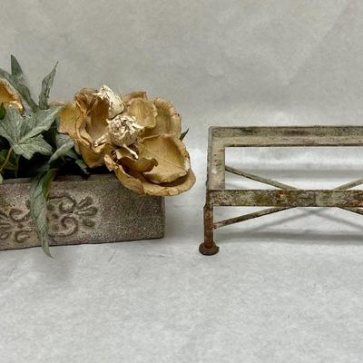 Rustic Faux Flower arrangement in Plaster planter box sitting atop rusty metal platform