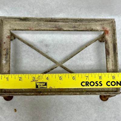 Rustic Faux Flower arrangement in Plaster planter box sitting atop rusty metal platform