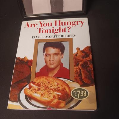 ELVIS COOK BOOK AND A FRAMED PICTURE OF ELVIS AND PRISCILLA