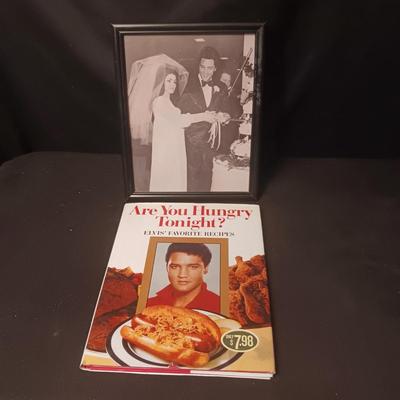 ELVIS COOK BOOK AND A FRAMED PICTURE OF ELVIS AND PRISCILLA