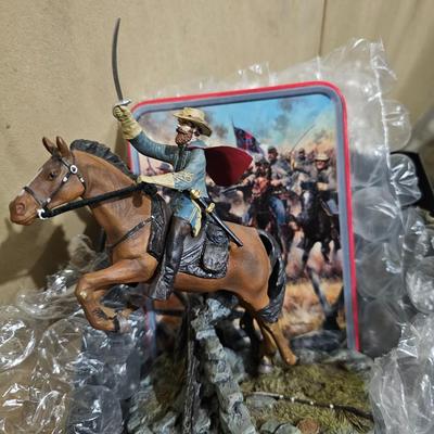 Sale Photo Thumbnail #4: HIGHLY SOUGHT AFTER AND HARD TO.FIND

This collector statue and plate display from Bradford Exchange features the portrait of Major General J.E.B. Stewart, known for his role in the American Civil War. The plate showcases a beautiful gray color that compl