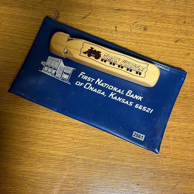 Onaga bank bag and train whistle