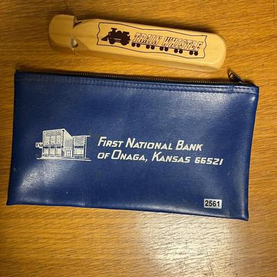 Onaga bank bag and train whistle