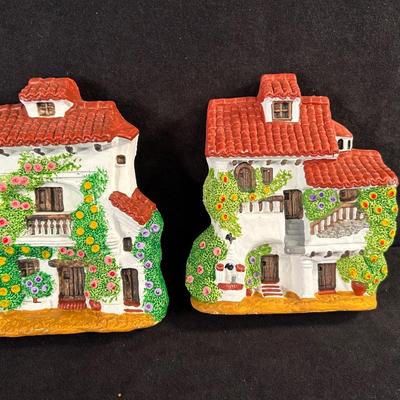 Lot 16. Pair of Clay Wall Plaques