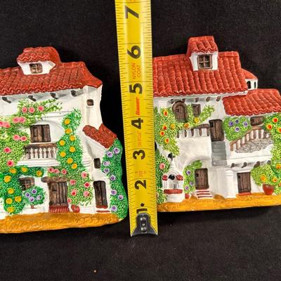 Lot 16. Pair of Clay Wall Plaques