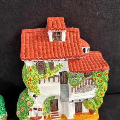 Lot 16. Pair of Clay Wall Plaques
