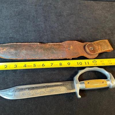 Lot 17. Collectible Knife with Leather Sheath