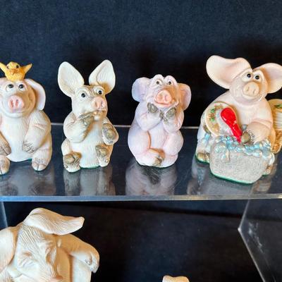 Lot 24. Ten Piggin Figurines