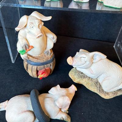 Lot 24. Ten Piggin Figurines