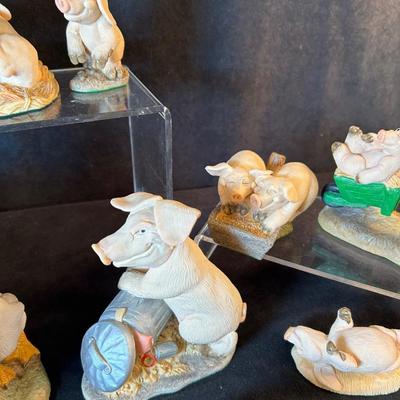 Lot 25. Ten Piggin Figurines
