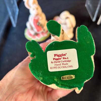Lot 27. Ten Piggin Figurines