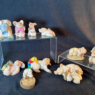 Lot 29. Ten Piggin Figurines