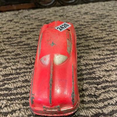 Small, red metal car