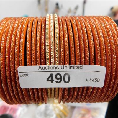 490 LOT OF 27 ORANGE BANGLE BRACELETS