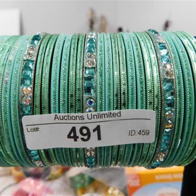 491 LOT OF 28 SEAFOAM BANGLE BRACELETS