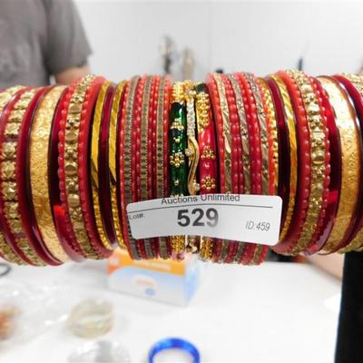529 LOT OF 21 RED BANGLE BRACELETS