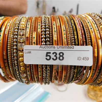 538 LOT OF 29 ORANGE BANGLE BRACELETS