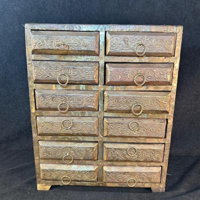 Lot 127. Middle Eastern Miniature Chest of Drawers