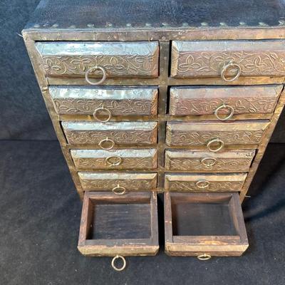 Lot 127. Middle Eastern Miniature Chest of Drawers