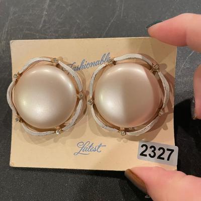 Big, beautiful, clip earrings