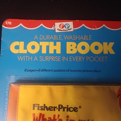 NEW FISHER-PRICE CLOTH BOOK W/A SURPRISE IN EVERY POCKET