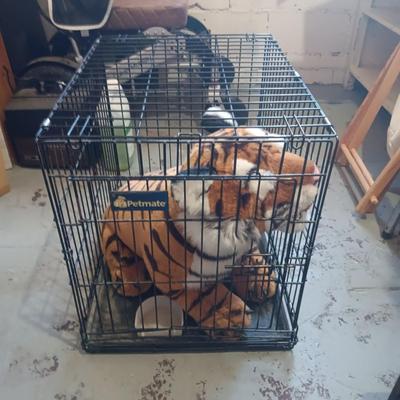 LARGE PLUSH TIGER IN A MEDIUM SIZE PETMATE KENNEL