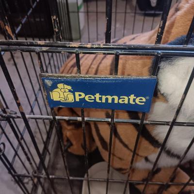 LARGE PLUSH TIGER IN A MEDIUM SIZE PETMATE KENNEL