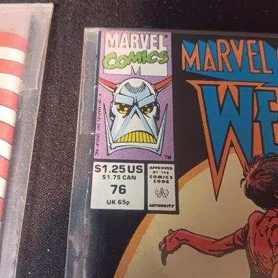 2 COMIC BOOKS (1)