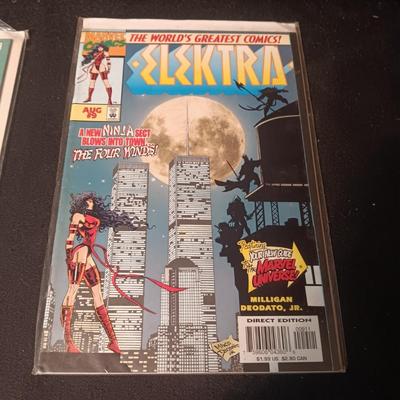 2 COMIC BOOKS (3)