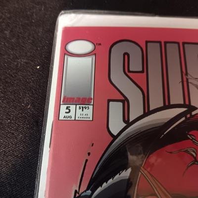 2 COMIC BOOKS (4)