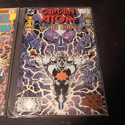 2 COMIC BOOKS (8)