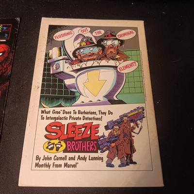 2 COMIC BOOKS (9)
