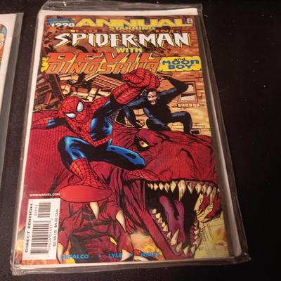2 COMIC BOOKS (11)