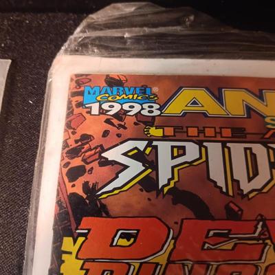 2 COMIC BOOKS (11)