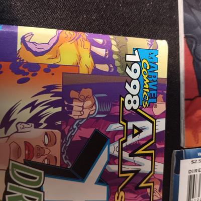 4 COMIC BOOKS (2)